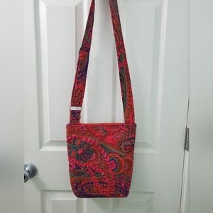 Crossbody bag with cosmetic bag